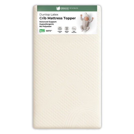 Dunlop Latex crib mattress topper packaging with a baby illustration on a white background